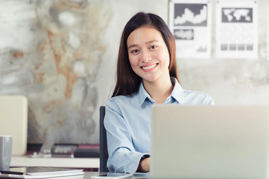 Woman getting her Dubai company license with TLZ