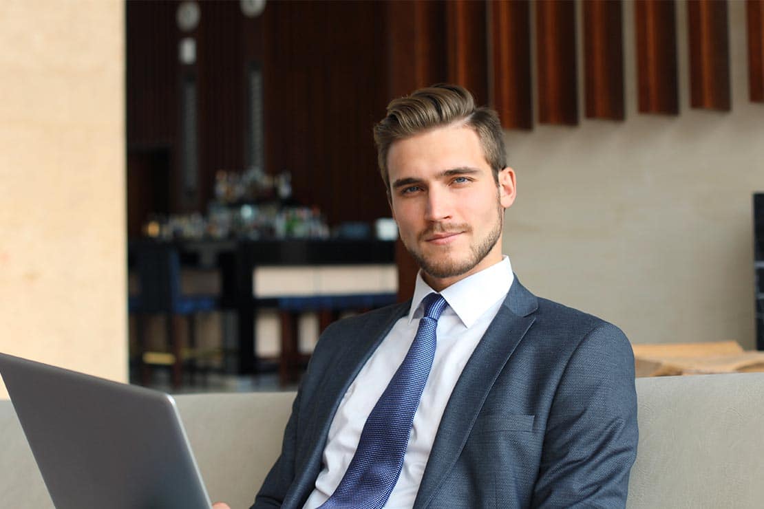 man in suit starting an online business in Dubai