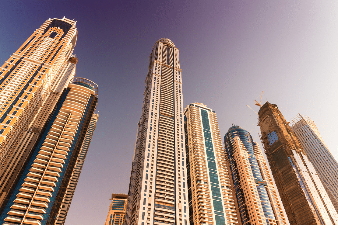 Can a company own an apartment in Dubai